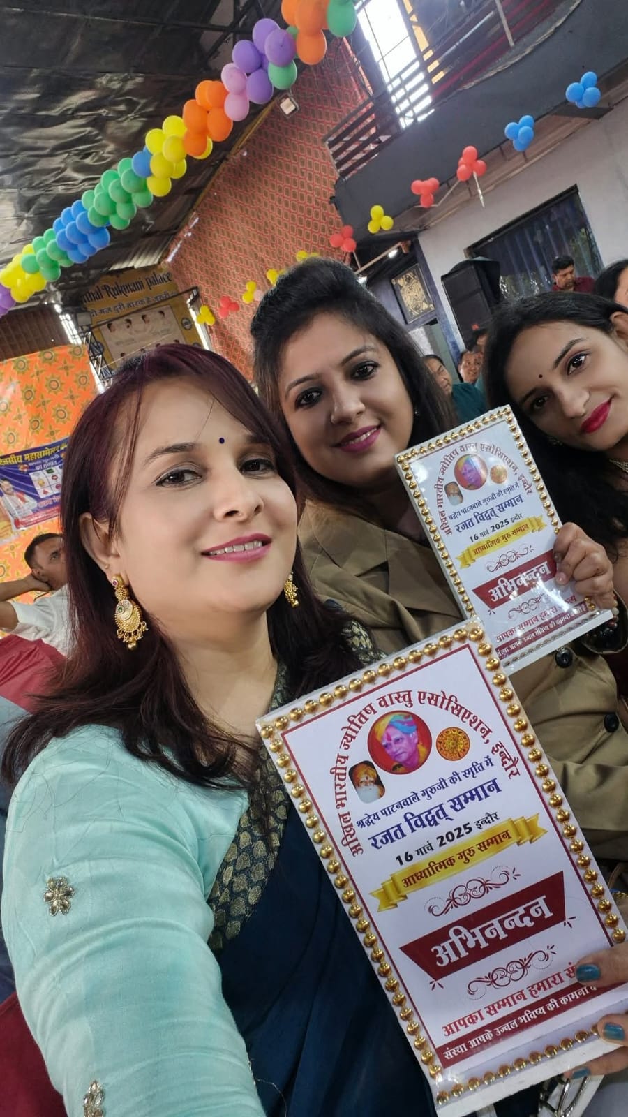 Astro Vandana with award certificates